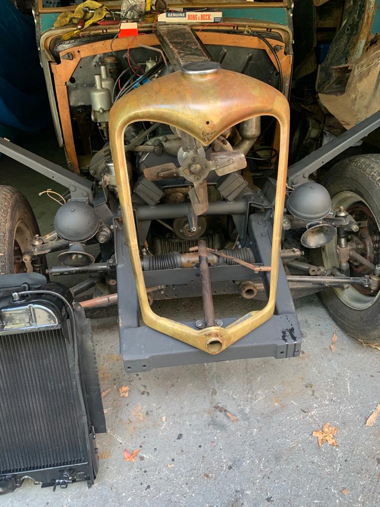Arthur Tarakjian of North Shore Radiators working on a classic car radiator