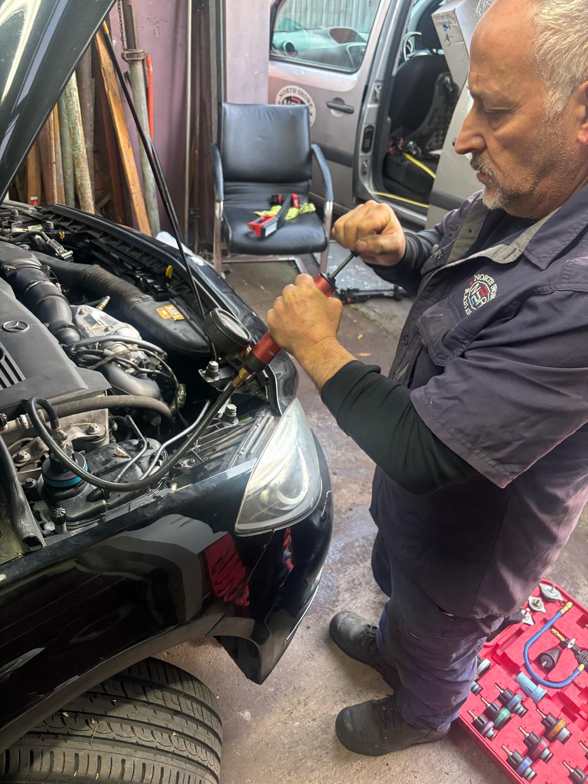 Arthur Tarakjian of North Shore Radiators working on Mercedes Benz AMG radiator